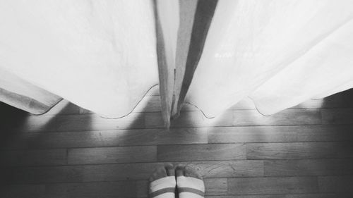 Low section of person on floor