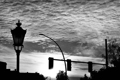 Low angle view of street light against sky