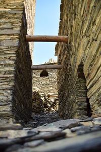 Close-up of old ruin building against sky