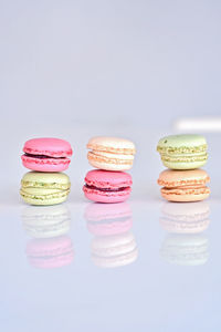 Various cake on table against white background