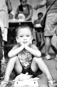 Portrait of boy sitting