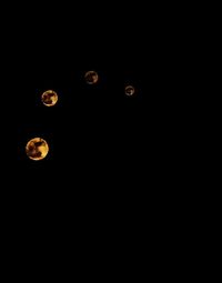 Close-up of moon over black background