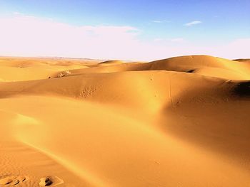 Scenic view of desert against sky