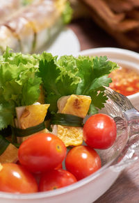 Close-up of fruits in plate on table