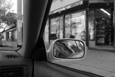 Reflection of car in city