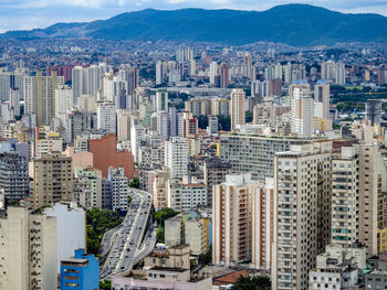 Cityscape against mountains