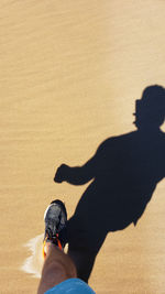 Shadow of people on sand