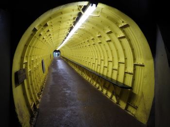 Illuminated tunnel in building