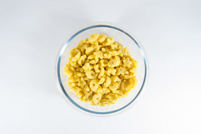 Directly above shot of food in bowl against white background