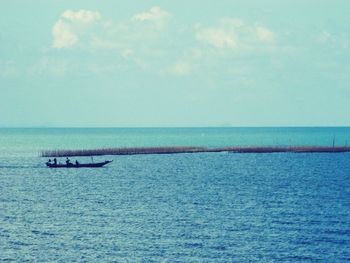 Scenic view of calm sea against sky