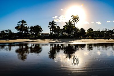 Scenic view of lake against sky during sunset