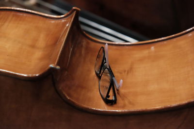Close-up of guitar on table