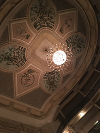 Low angle view of illuminated ceiling