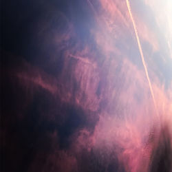 Low angle view of vapor trails in sky