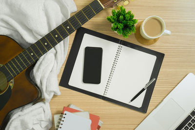 High angle view of coffee cup on table