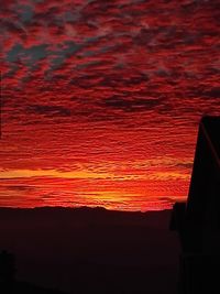 Close-up of silhouette against sky during sunset