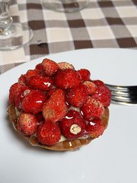 High angle view of strawberries in plate on table