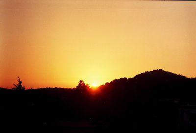 Silhouette of mountain at sunset