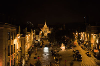 High angle view of vehicles on road at night