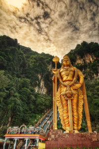 Statue of temple against sky