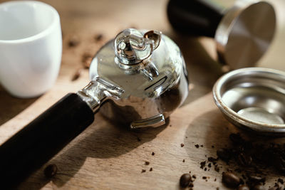 High angle view of coffee cup on table