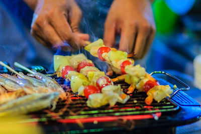 Close-up of person preparing food