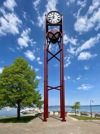 Low angle view of clock tower against sky