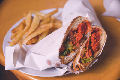 Close-up of food served on table