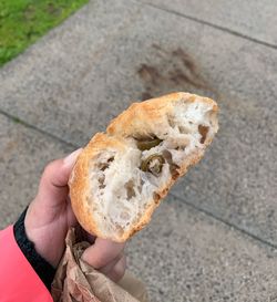 Close-up of hand holding bread