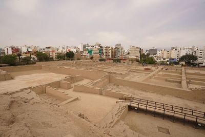 High angle view of buildings in city against sky