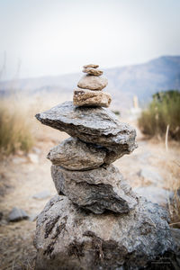 Close-up of stone stack on rock