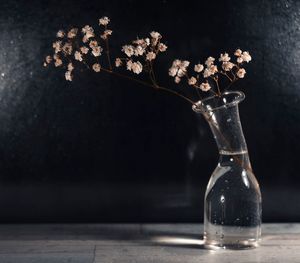 Close-up of glass vase on table