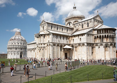 People in front of historic building