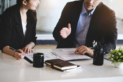 Business colleagues working on table