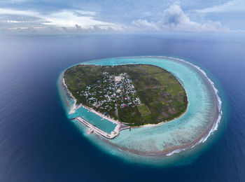 High angle view of thoddoo island and sea against sky