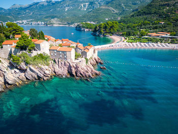 Scenic view of sea against mountain