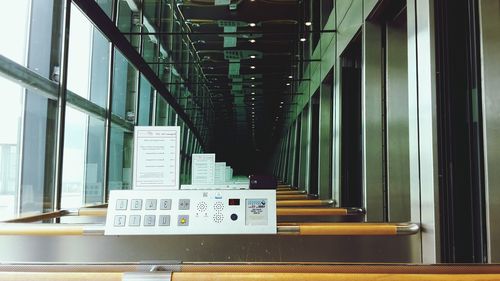 Push buttons and mirror in elevator