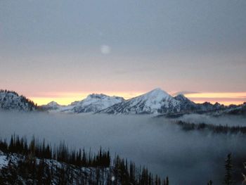 Scenic view of mountains against clear sky during winter