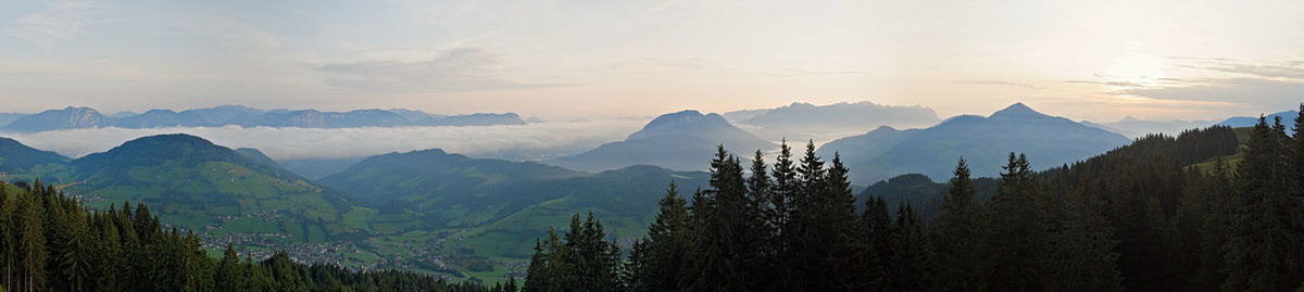 Panoramic view of mountains against sky during sunset