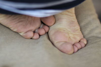 Low section of baby feet