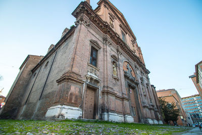 Low angle view of historic cathedral against sky