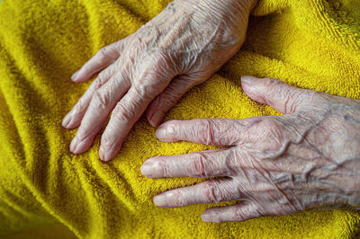 Aging process. very old senior woman hands wrinkled skin person