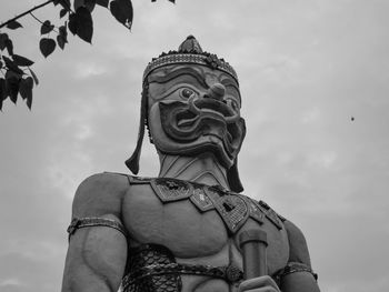 Low angle view of statue against sky