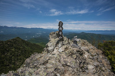 Scenic view of rock formation against sky