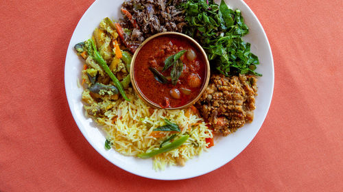 High angle view of indian food served on table