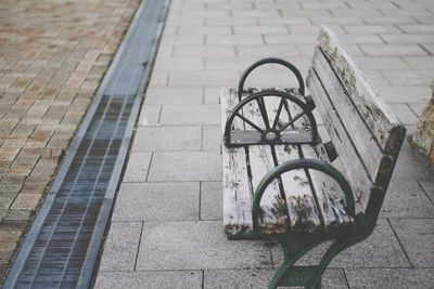 Empty wooden bench at park