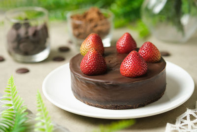 Close-up of strawberries in plate on table