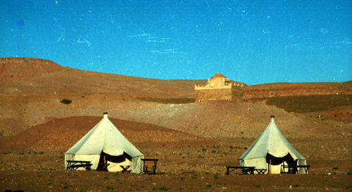 View of landscape against blue sky