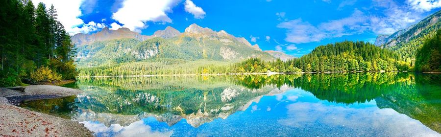 Panoramic view of lake and mountains against sky