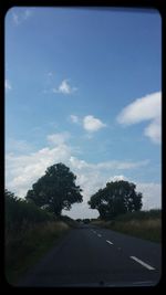 Country road passing through landscape